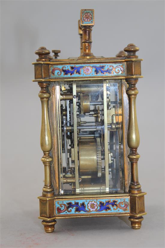 A late 19th century French gilt brass and champleve enamel hour repeating carriage alarum clock, 4.75in., with travelling case